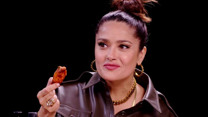 Salma Hayek Adopts Sean Evans While Eating Spicy Wings
