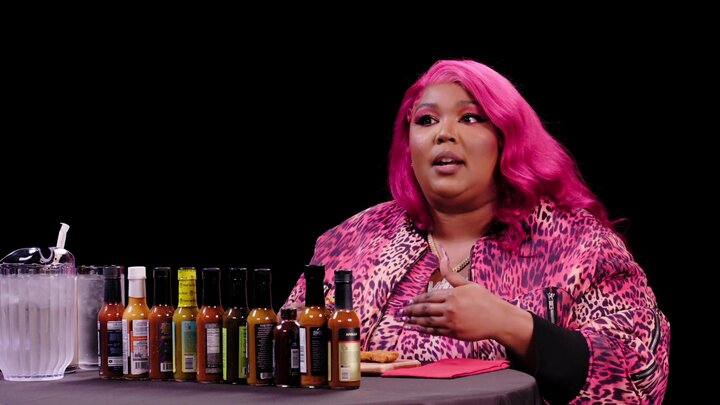 Lizzo Earns Her Hot Sauce Crown While Eating Spicy Wings