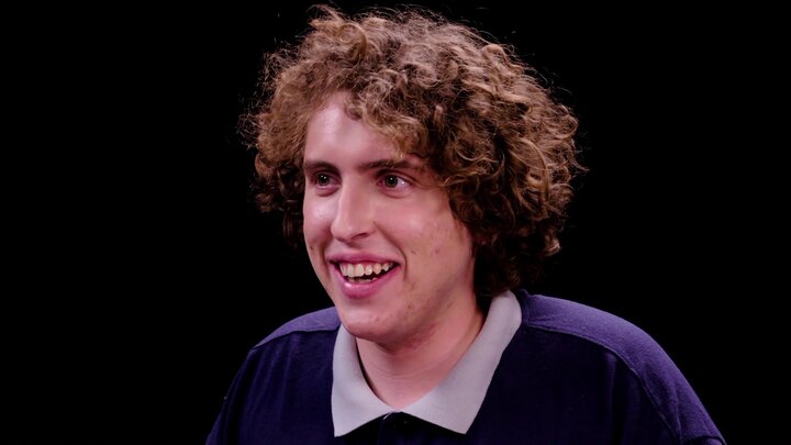 Andrew Callaghan Goes for the Marrow While Eating Spicy Wings