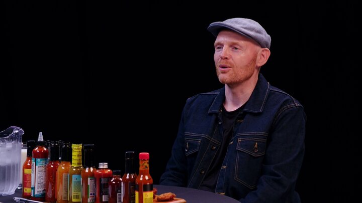 Bill Burr Gets Red in the Face While Eating Spicy Wings