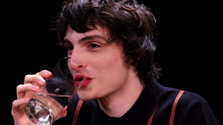 Finn Wolfhard Embraces Insanity While Eating Spicy Wings
