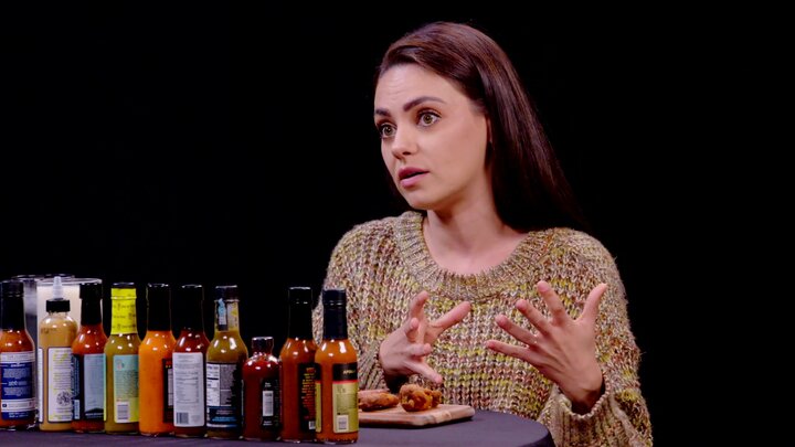 Mila Kunis Hits the Ranch While Eating Spicy Wings
