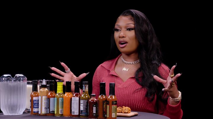 Megan Thee Stallion Turns Into Hot Girl Meg While Eating Spicy Wings