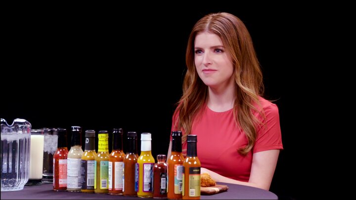 Anna Kendrick Gets the Giggles While Eating Spicy Wings