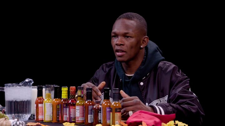 Israel Adesanya Gives Thanks While Eating Spicy Wings